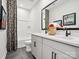Modern bathroom featuring a double sink vanity, black fixtures and a shower and tub combination at 133 Armstrong Rd, Belmont, NC 28012