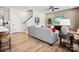 Living room with staircase, comfortable gray sofa, and modern decor accents at 133 Armstrong Rd, Belmont, NC 28012