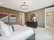 Main bedroom featuring a large bed, neutral tones, and decor accents at 133 Armstrong Rd, Belmont, NC 28012