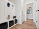 Mudroom featuring built-in storage and access to half bath at 133 Armstrong Rd, Belmont, NC 28012