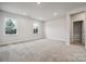 Spacious bedroom with carpeted floor and ample natural light at 108 Brooke Forest Ct, Mooresville, NC 28115