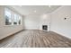 Living room with hardwood floors, fireplace, and recessed lighting at 108 Brooke Forest Ct, Mooresville, NC 28115