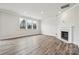 Living room with hardwood floors, fireplace, and recessed lighting at 108 Brooke Forest Ct, Mooresville, NC 28115
