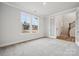 Spacious office with French doors, hardwood floors, and natural light at 108 Brooke Forest Ct, Mooresville, NC 28115