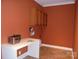 Practical laundry room with cabinets, counter space, and modern equipment, making chores a breeze at 1302 Devonmere Pl, Salisbury, NC 28144