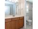 Well-lit bathroom with wood vanity and toilet at 3203 Kelsey Plz, Kannapolis, NC 28081