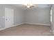 Bright bedroom with neutral walls and carpet at 3203 Kelsey Plz, Kannapolis, NC 28081