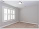 Bright bedroom with neutral walls and carpet flooring at 3203 Kelsey Plz, Kannapolis, NC 28081