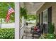 Relaxing front porch with rocking chairs and hanging plants at 3203 Kelsey Plz, Kannapolis, NC 28081