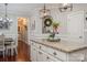 Kitchen island with granite countertops and breakfast bar at 3203 Kelsey Plz, Kannapolis, NC 28081