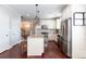 Open concept kitchen with island and stainless steel appliances at 3203 Kelsey Plz, Kannapolis, NC 28081