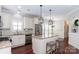 Kitchen boasts granite counters, stainless steel appliances, and an island at 3203 Kelsey Plz, Kannapolis, NC 28081