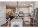 Island kitchen with granite counters and stainless steel appliances at 3203 Kelsey Plz, Kannapolis, NC 28081