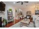 Living room with hardwood floors and built-in shelving at 3203 Kelsey Plz, Kannapolis, NC 28081