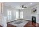Bright living room with hardwood floors and fireplace at 3203 Kelsey Plz, Kannapolis, NC 28081