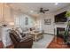 Cozy living room with sectional sofa and hardwood floors at 3203 Kelsey Plz, Kannapolis, NC 28081
