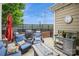 Relaxing patio with comfortable seating, a fire pit, and a built-in grill at 3203 Kelsey Plz, Kannapolis, NC 28081