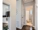 Hallway leading to a bathroom with tile flooring and a shower/tub combination at 3210 Marlborough Rd, Charlotte, NC 28208