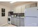 Efficient kitchen featuring modern cabinetry, stainless appliances, and granite countertops at 3210 Marlborough Rd, Charlotte, NC 28208