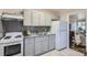 Efficient kitchen featuring modern cabinetry, stainless appliances, and granite countertops at 3210 Marlborough Rd, Charlotte, NC 28208
