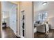 Inviting living room with hardwood floors, a comfortable sofa, and a built-in shelving unit at 3210 Marlborough Rd, Charlotte, NC 28208