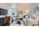 Inviting living room with neutral tones, stylish furnishings, and ample natural light at 3210 Marlborough Rd, Charlotte, NC 28208
