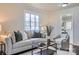 Inviting living room with neutral tones, stylish furnishings, and ample natural light at 3210 Marlborough Rd, Charlotte, NC 28208