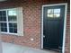 Black front door with glass panels and sidelights at 118 Abbington Ln, Shelby, NC 28150