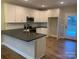 Modern kitchen with white cabinets and granite counters at 118 Abbington Ln, Shelby, NC 28150