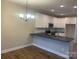 Modern kitchen with white cabinets and granite counters at 118 Abbington Ln, Shelby, NC 28150