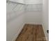 Large walk-in closet with wire shelving and hardwood floors at 118 Abbington Ln, Shelby, NC 28150