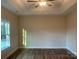 Spacious bedroom featuring hardwood floors and a window at 120 Abbington Ln, Shelby, NC 28150