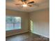 Bright bedroom with wood floors and a large window at 120 Abbington Ln, Shelby, NC 28150