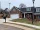 Brick ranch home with attached garage and landscaped lawn at 120 Abbington Ln, Shelby, NC 28150