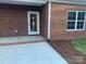 Brick home exterior with white door and window at 120 Abbington Ln, Shelby, NC 28150