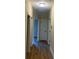 Bright hallway with hardwood floors and multiple doors at 120 Abbington Ln, Shelby, NC 28150