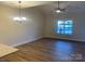 Living room with hardwood floors and a ceiling fan at 120 Abbington Ln, Shelby, NC 28150