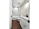 Bathroom with soaking tub, marble tile, and white vanity at 1239 Beltline Rd # 10, Chester, SC 29706