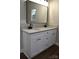 Double vanity with gray countertop and black faucets at 1239 Beltline Rd # 10, Chester, SC 29706