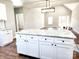 Kitchen island with white cabinets and granite countertop at - Beltline Rd # 10, Chester, SC 29706