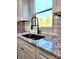 Kitchen sink with a black gooseneck faucet and granite countertop at 1239 Beltline Rd # 10, Chester, SC 29706