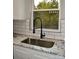 Modern kitchen sink with black faucet and granite countertop at 1239 Beltline Rd # 10, Chester, SC 29706