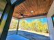 Covered porch with wood ceiling, ceiling fan, and view of the backyard at - Beltline Rd # 10, Chester, SC 29706