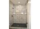 Large walk-in shower with marble-look tile at 1239 Beltline Rd # 10, Chester, SC 29706