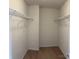 Walk-in closet with shelving and carpeted flooring at 1009 Dawn Light Rd, Indian Trail, NC 28079