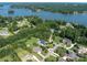 Aerial view of luxurious lakeside community with well-manicured lawns, pools, and lake access at 127 Palos Verde Rd, Mooresville, NC 28117