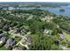 Aerial view of Lake Norman neighborhood with well-maintained homes and lush landscaping at 127 Palos Verde Rd, Mooresville, NC 28117