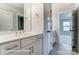 Bathroom with white vanity and view to bedroom at 1770 Post Ct # Lot 510, Gastonia, NC 28054