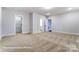 Bright bedroom with wall-to-wall carpet and ensuite access at 1770 Post Ct # Lot 510, Gastonia, NC 28054