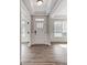 Bright foyer with natural light, hardwood floors, and an open layout leading to other areas of the home at 1770 Post Ct # Lot 510, Gastonia, NC 28054